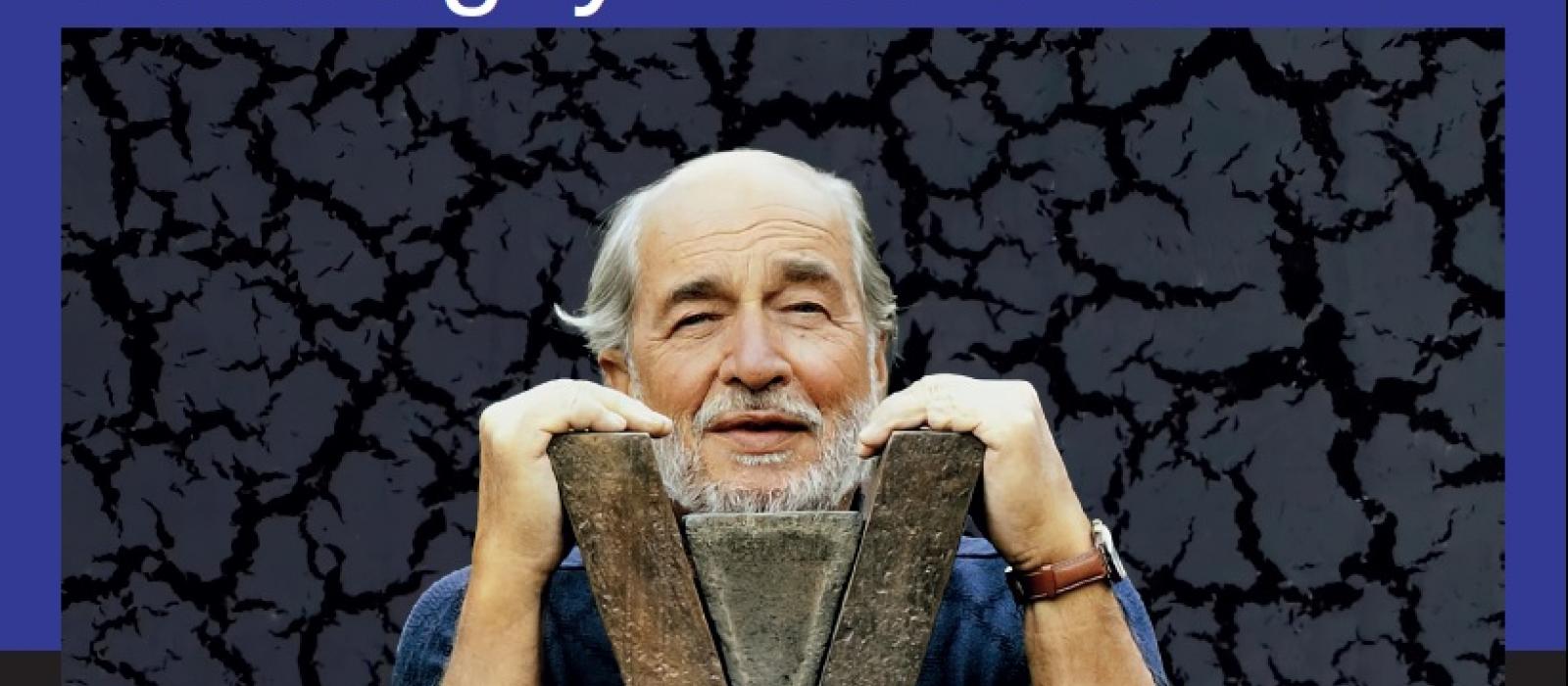 Affiche de l'exposition avec un portrait d'André Bucher et une de ses sculptures
